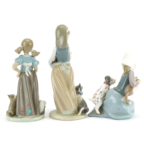 1205 - Three Lladro porcelain figurines comprising Little Friskies 5032, Playful Kittens 5232 and Following... 