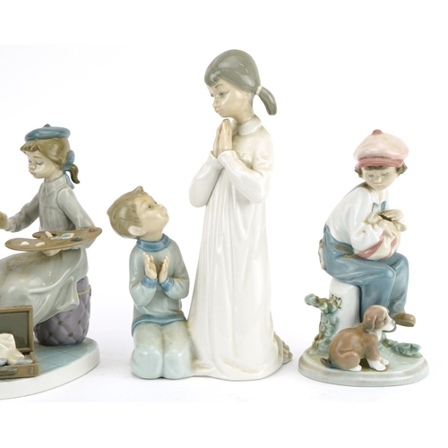 1199 - Four Lladro porcelain figure groups comprising numbers 4779, 5401, 5451 and 5363, the largest 21.5cm... 