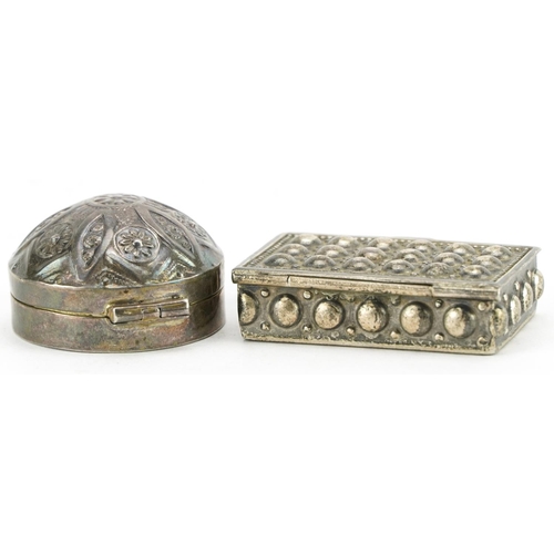 303 - Two Persian silver pillboxes with hinged lids, the largest 4.5cm wide, total 34.2g