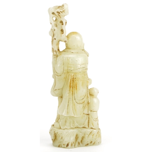 1230 - Chinese jade style figure of an elder and child holding fruit and a scroll, 20cm high