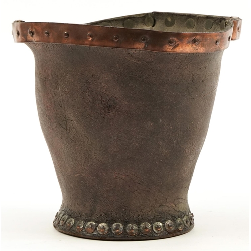 464 - Antique copper bound leather fire bucket with studwork, 23cm high