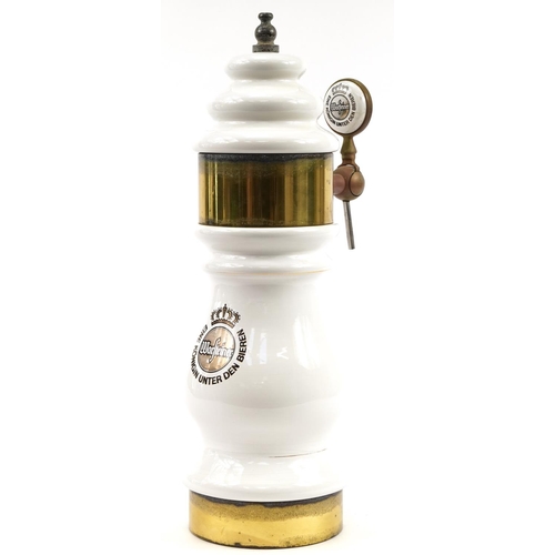 202 - Large German Warsteiner beer pump with brass mounts and tap, 69cm high