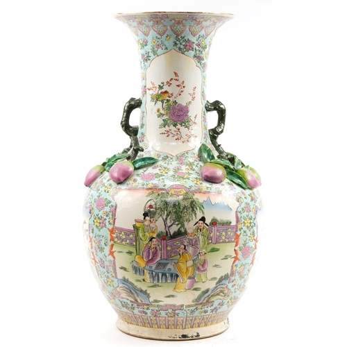 497 - Large Chinese porcelain floor standing vase decorated in relief with peaches, hand painted in the fa... 