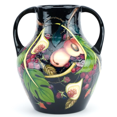 Emma Bossons for Moorcroft, large pottery vase with twin handles hand painted in the Queen's Choice pattern with peaches and grapes, 26.5cm high