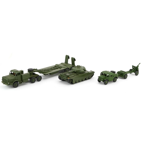 2024 - Three vintage Dinky Toys diecast army vehicles with boxes comprising Tank Transporter 660, 25-Pounde... 