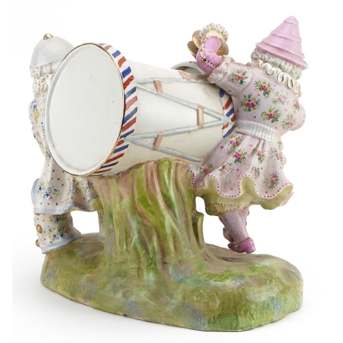 1280 - Continental bisque porcelain figural centrepiece of two drummers, 35cm in length