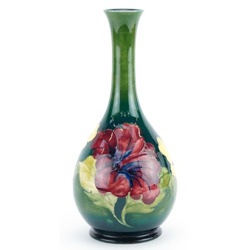151 - Moorcroft pottery vase hand painted with lilies, 26cm high