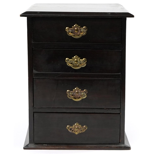 512 - Hardwood four drawer collector's chest with ornate brass handles, 34cm H x 27cm W x 30cm D