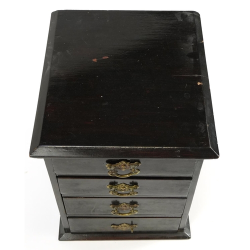 512 - Hardwood four drawer collector's chest with ornate brass handles, 34cm H x 27cm W x 30cm D