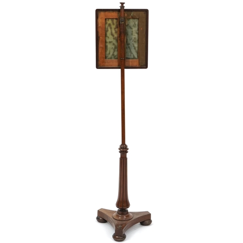 1094 - Regency mahogany pole screen with triangular base and tapestry screen embroidered with a seated gent... 