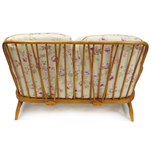 1058 - Ercol Jubilee light elm two seater settee, 140cm wide