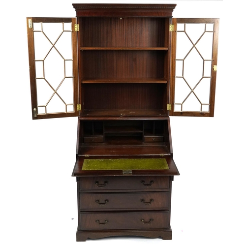 1029 - Mahogany bureau bookcase fitted with a pair of glazed door above a fall, with fitted interior and fo... 