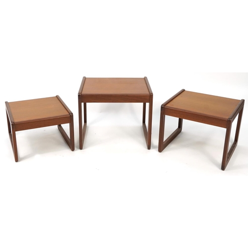 1056 - Nest of three mid century teak occasional tables, the largest 43cm H x 50cm W x 43cm D