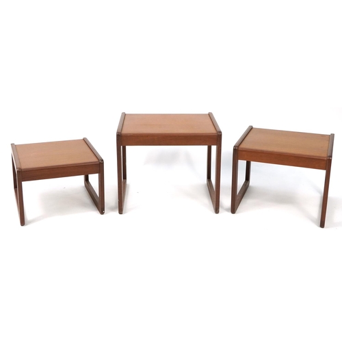 1056 - Nest of three mid century teak occasional tables, the largest 43cm H x 50cm W x 43cm D