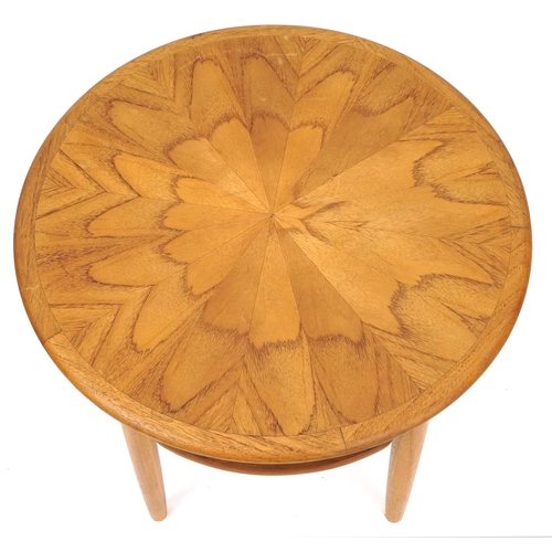 1054 - Lightwood occasional table with cane under tier, 48.5cm high x 55cm in diameter