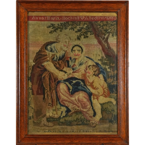 1586 - Two figures and a child, 19th century woolwork sampler worked by Anna Maria Bocking, framed and glaz... 