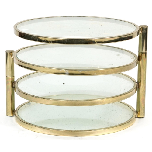 1014 - Contemporary gilt metal and glass four tier revolving occasional table, 41.5cm high x 53.5cm in diam... 