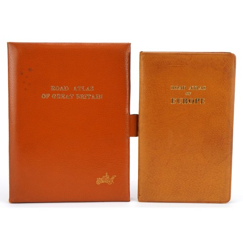 2476 - Motoring interest vintage leather cased road atlas of Europe and a leather cased road atlas of Great... 