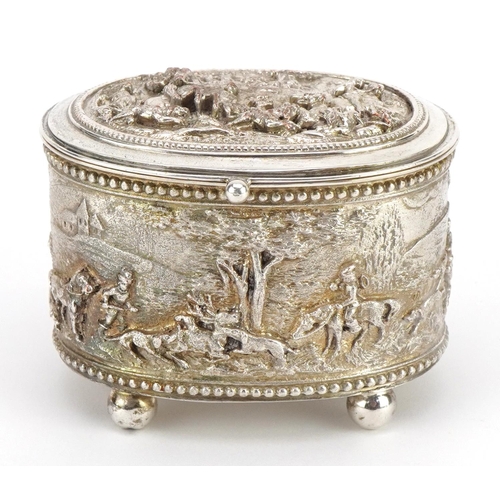 557 - French silver plated copper four footed jewel casket decorated in relief with huntsmen, impressed A ... 