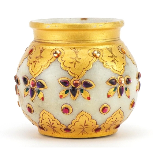 559 - Egyptian style alabaster jewelled vase with gilded decoration, 8.5cm high