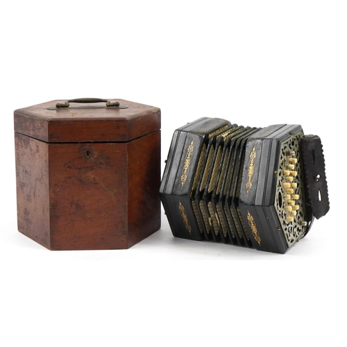 178 - Victorian ebonised thirty two button concertina with pierced metal end plates and velvet lined case,... 