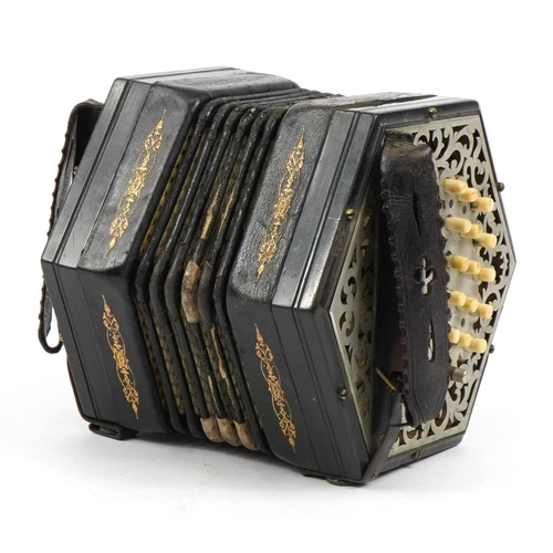 178 - Victorian ebonised thirty two button concertina with pierced metal end plates and velvet lined case,... 