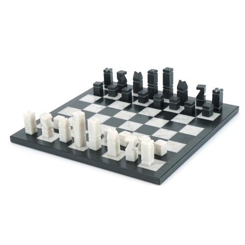 2003 - Black slate and white marble chess set with board, the largest piece 4.5cm high, the board 22cm x 22... 