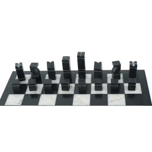 2003 - Black slate and white marble chess set with board, the largest piece 4.5cm high, the board 22cm x 22... 