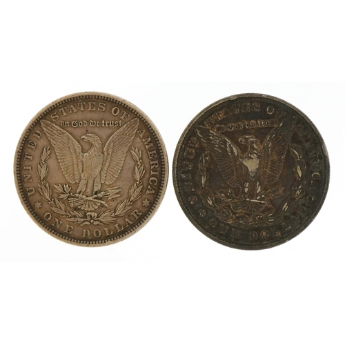 2379 - Two United States of America silver dollars comprising dates 1880 and 1883