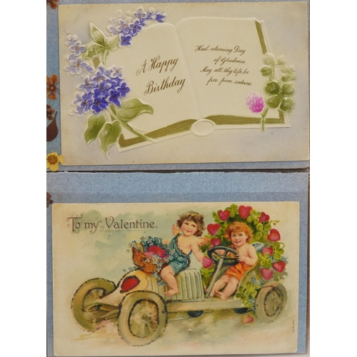 2258 - Edwardian and later greetings and topographical postcards arranged in two albums including Carlisle ... 