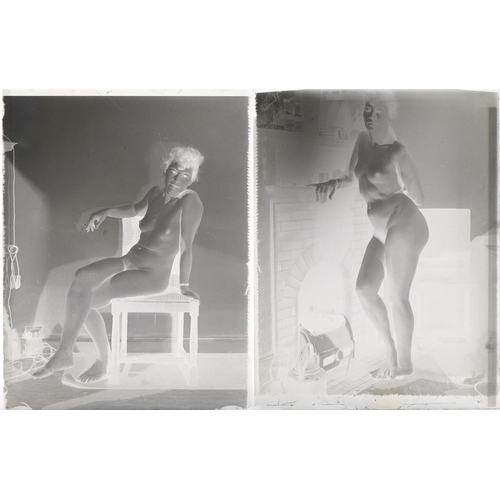 2475 - Two vintage black and white glass photographic slides of nude females, each 11cm x 8.5cm