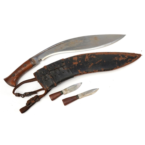 2199 - Military interest Gurkha's Kukri knife with hardwood handle, steel blade and leather sheath, impress... 