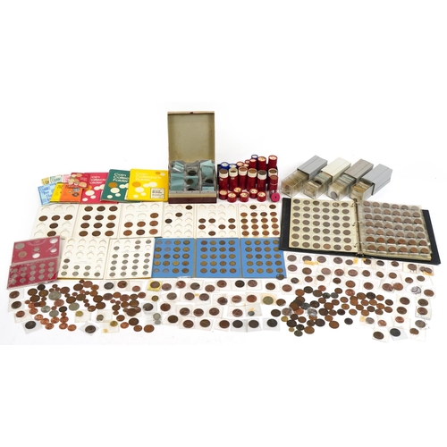 2471 - Large collection of British coinage, some arranged in albums and some pre 1947 including pennies, fl... 