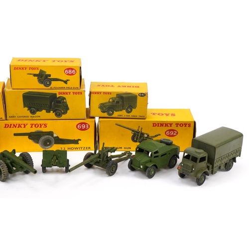 2030 - Seven Dinky Toys diecast army vehicles with boxes comprising Army 1-Ton Cargo Truck 741, 25-Pound Fi... 