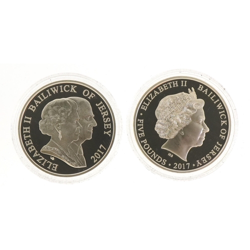 2410 - Two Elizabeth II silver proof five pound coins with fitted cases comprising 2017 Remembrance Poppy c... 