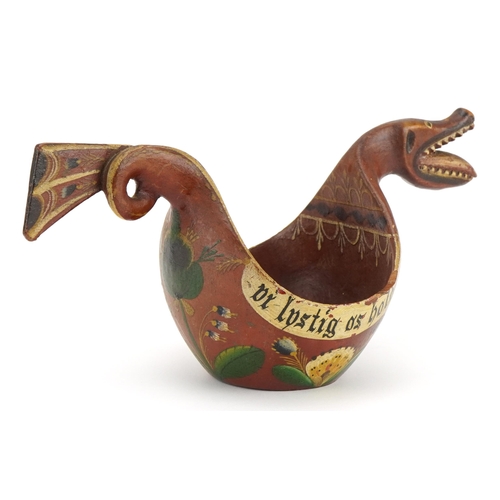 288 - Norwegian treen Kasa ale cup in the form of a dragon, hand painted with flowers, 23cm in length