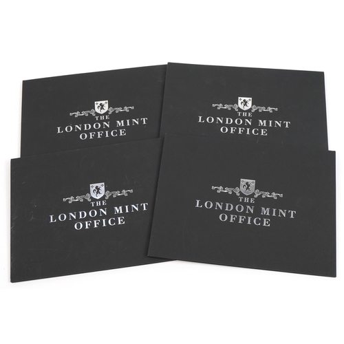 2439 - Four London Mint Office Sir Winston Churchill Remembered coin and five pound banknote sets