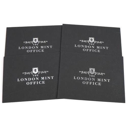 2440 - Four London Mint Office Sir Winston Churchill Remembered coin and five pound banknote sets