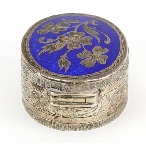 227 - Oval unmarked silver and blue enamel trinket box with hinged lid and mirrored interior, 5.2cm wide, ... 