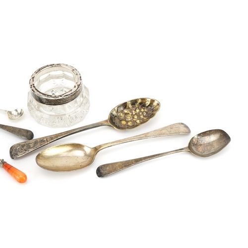 439 - Five Georgian and later silver spoons, glass salt with silver collar and white metal page marker wit... 