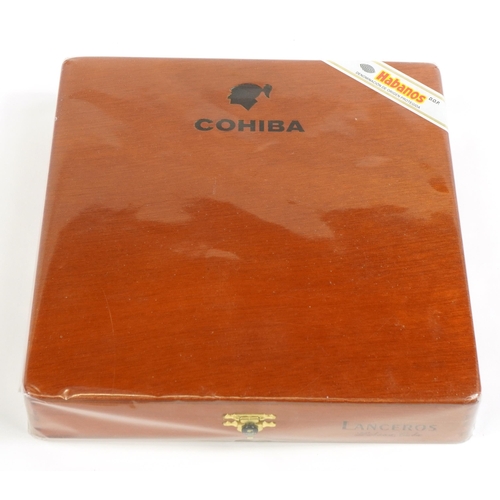 107 - Sealed box of twenty five Cohiba Habanos Lanceros cigars
PROVENANCE: Given to the vendor's friend by... 