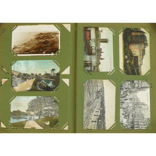 2239 - Good collection of Edwardian topographical and social history postcards arranged in an album, some r... 