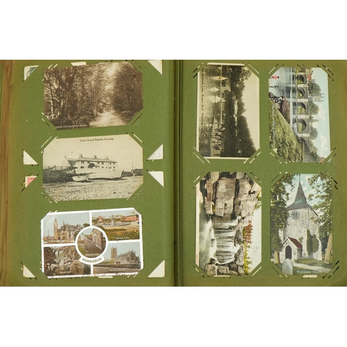 2239 - Good collection of Edwardian topographical and social history postcards arranged in an album, some r... 