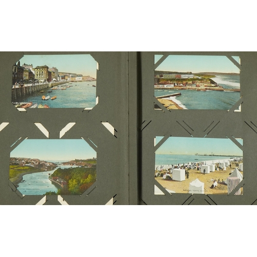 2240 - Early 20th century and later topographical and social history postcards arranged in an album, some o... 