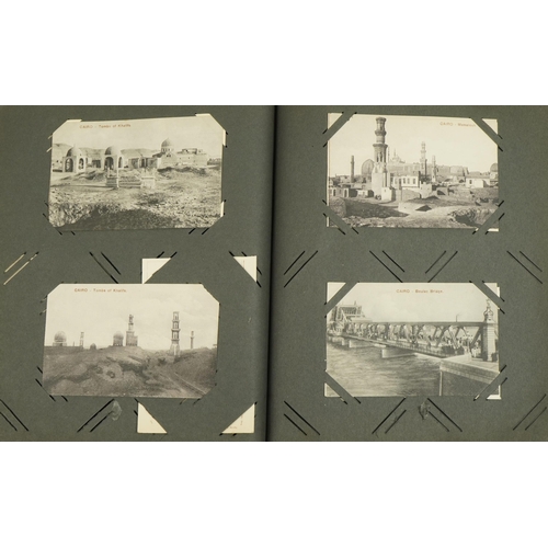 2240 - Early 20th century and later topographical and social history postcards arranged in an album, some o... 