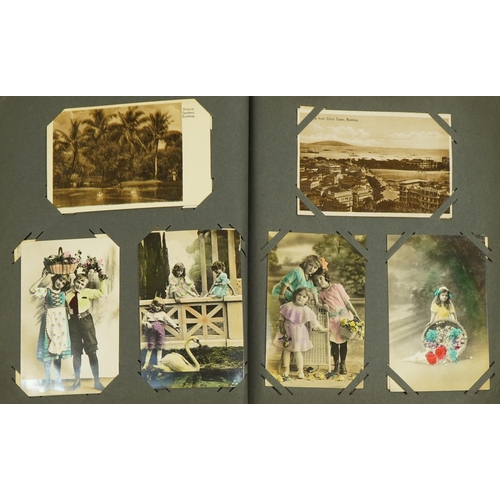 2240 - Early 20th century and later topographical and social history postcards arranged in an album, some o... 