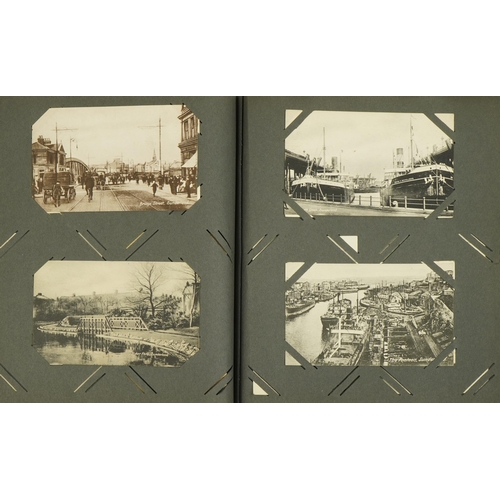 2240 - Early 20th century and later topographical and social history postcards arranged in an album, some o... 