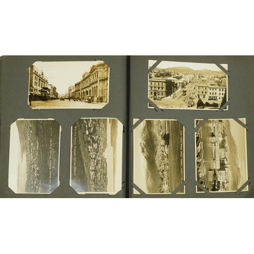 2240 - Early 20th century and later topographical and social history postcards arranged in an album, some o... 