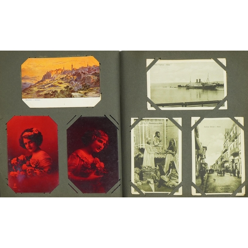 2240 - Early 20th century and later topographical and social history postcards arranged in an album, some o... 