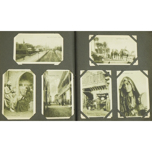 2240 - Early 20th century and later topographical and social history postcards arranged in an album, some o... 